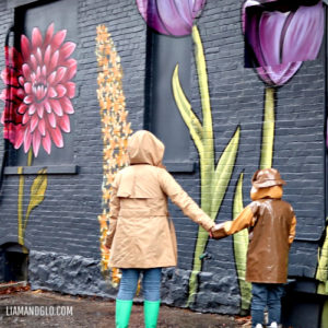 LIAM AND GLO FLOWER MURAL IN THE RAIN